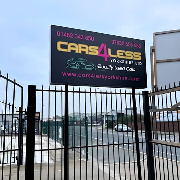 An image of a Cars 4 Less monument sign.